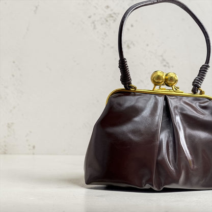 Pochette pour femme en simili cuir semi-brillant avec fermeture à clic-clac vintage et bandoulière