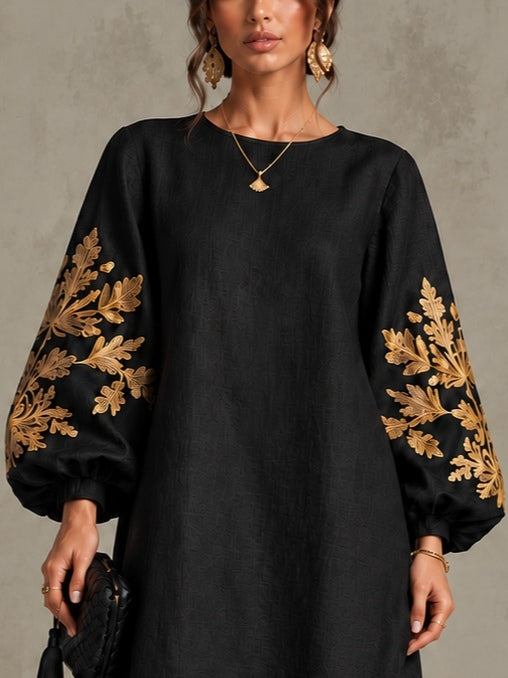Nina | Robe midi ample à col rond et manches lanterne, imprimé « Black Gold »
